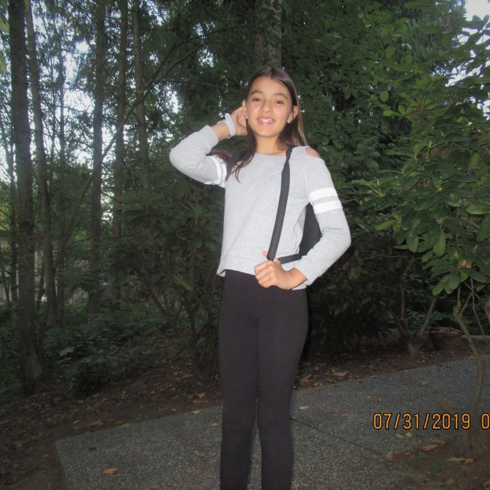 Grey cold shoulder top w/ white strips on sleeves